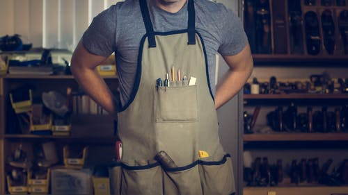 A plumber in overalls